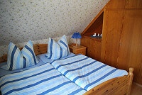 Schlafzimmer Ferienwohnung Liane 2 im Deepenweg Schönberger Strand