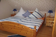Schlafzimmer mit Doppelbett